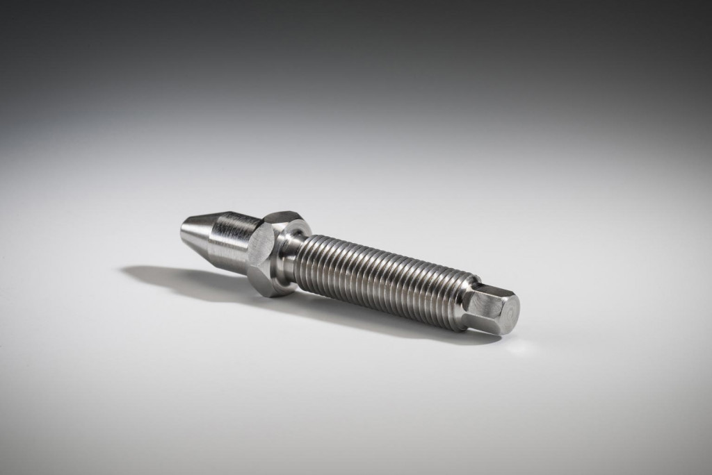 Threaded precision machined part with hex end